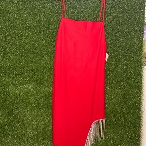 Red maxi dress with diamond details.